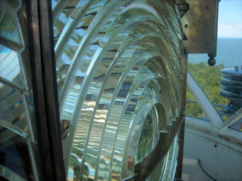 Photo: Devils Island Light Fresnel lens close up from inside tower lamp room, Apostle Islands, Lake Superior, Wisconsin.