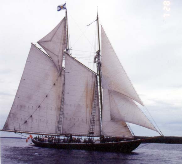 [Photo: Gaff Schooner HIGHLANDER at dusk.]
