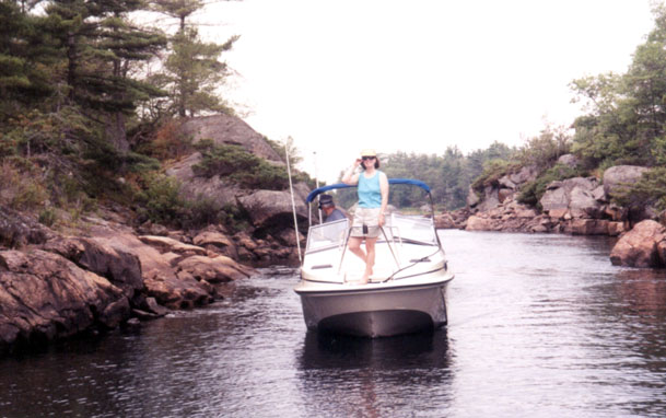 [Photo: Boston Whaler 20-Revenge at narrow exit to Go Home Bay.]