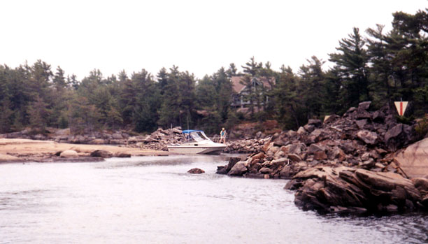 [Photo: Boston Whaler 20-Revenge at VERY narrow exit to Go Home Bay.]