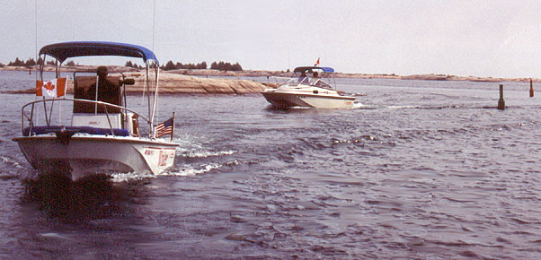 [Photo: MEMORY and CONTINUOUSWAVE close on the stern of WHALE LURE