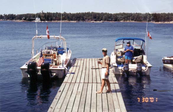 [Photo: 25 and 20 foot Whalers at dock, Ojibway Club]