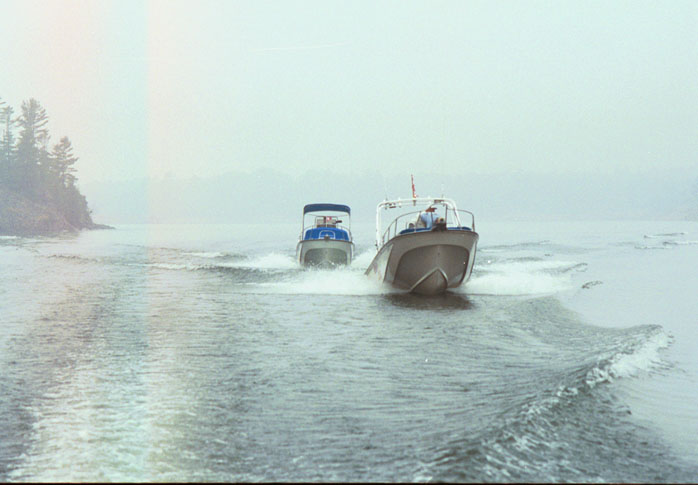 [Photo: Whalers in fog in Collins Inlet.]