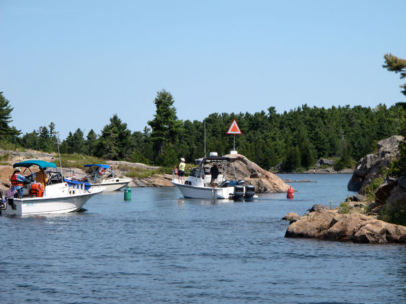 Photo: Three boat at Obstacle Island.