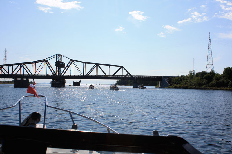 Photo: Boston Whaler boats approach the swing bridge at Little Current, Ontario.