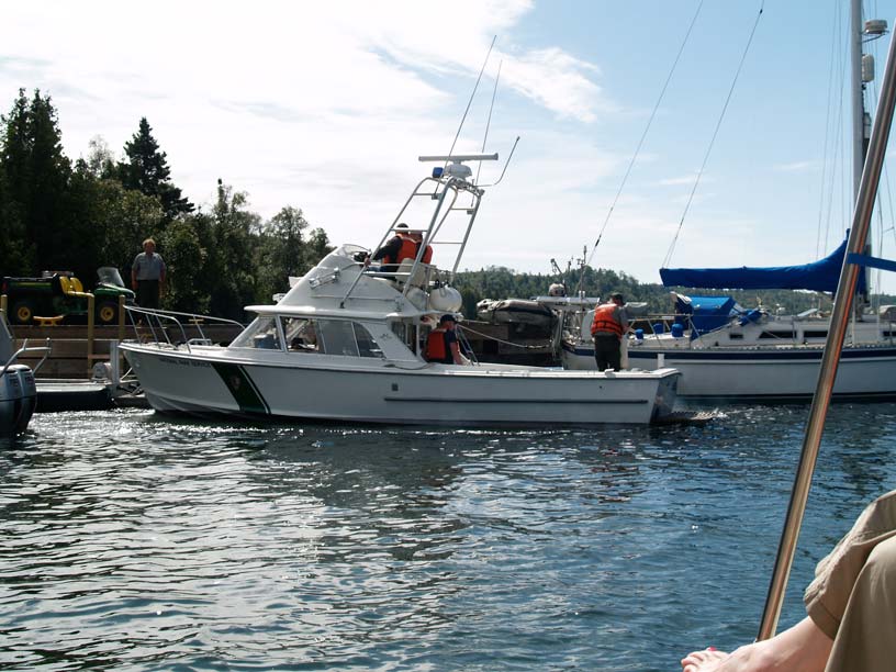 Photo: Bertram 31 muevers at main dock, Washington Harbor, Isle Royale, Lake Superior.