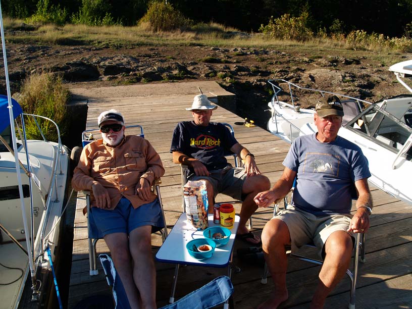 Photo: Boaters relax on the dock at McCargoe Cove, Isle Royale, Lake Superior.