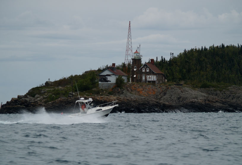 Photo: Boston Whaler REVENGE 22 HOMEASIDE on plane in the Amygdaloid Channel.