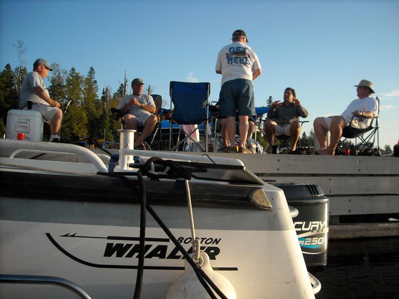 Photo: Boston Whaler boat owners relax at the dock at Hay Bay, Isle Royale, Lake Superior.