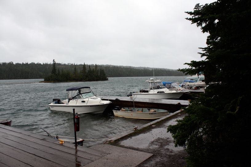 Photo: Boat at dock in Tobin Harbor, Isle Royale, during Lake Superior gale, September 2010.