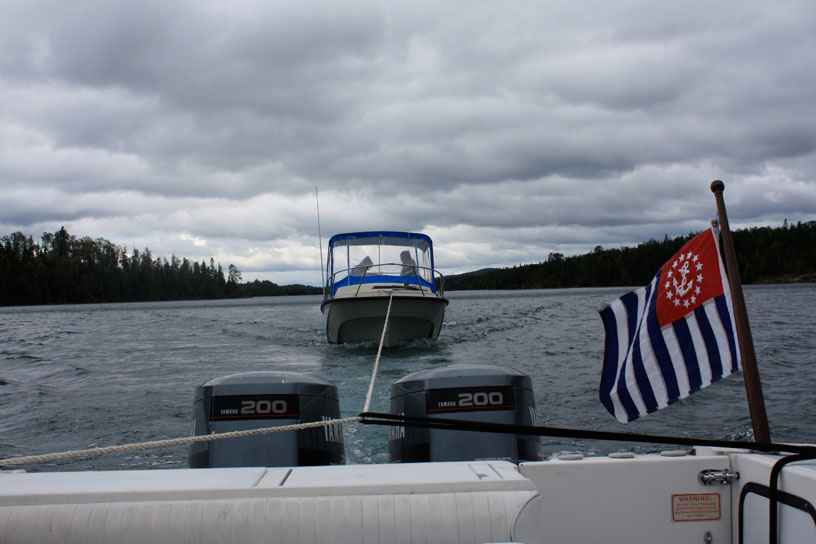 Photo: View from cockpit of HOLLY MARIE with INVICTUS in tow, Isle Royale, Lake Superior.