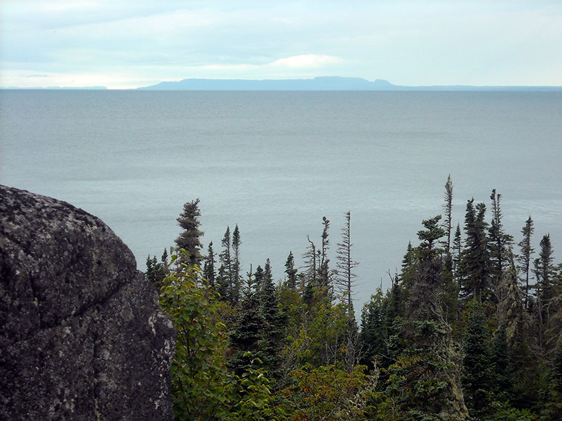 Photo: View of Canadian shore in the distance from Passage Island.