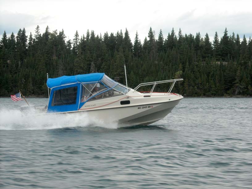 Photo: Boston Whaler REVENGE 22 HOMEASIDE on plane in the Amygdaloid Channel.