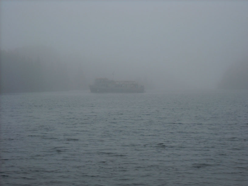 Photo: Ferry approaching dock at Chippewa Harbor in fog.