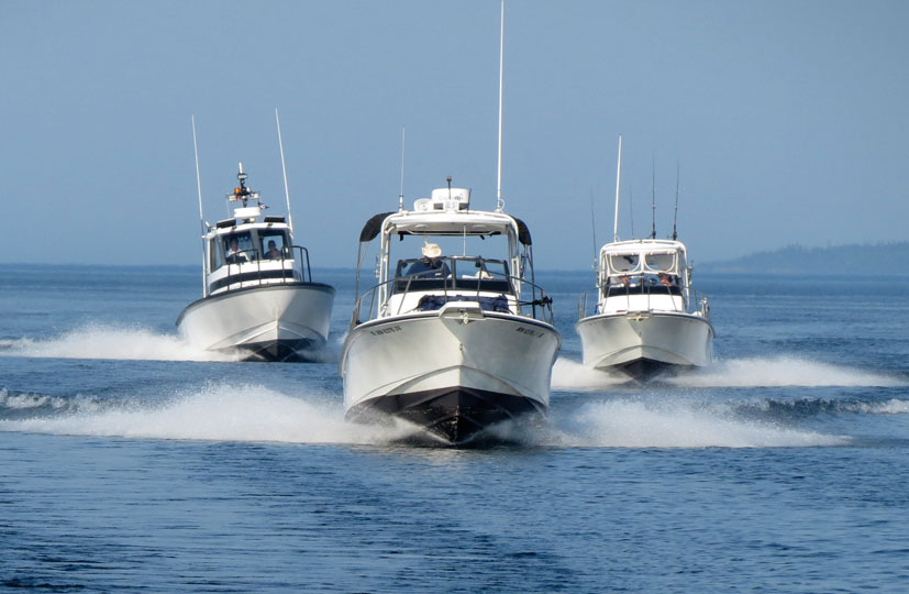 Photo: Three boats in close echelon formation.