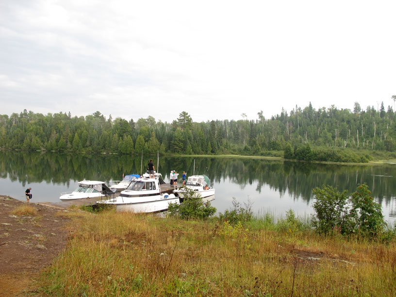 Photo: Five boats rafted at dock in McCargoe Cove, Isle Royale National Park.