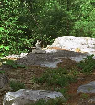 Photo: Trail thru granite