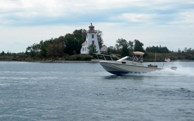 Photo: Strawberry Light near Manitoulin Island, Ontario, with LITTLE ZEPHYR in the foreground.