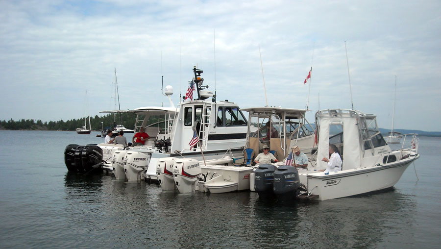 Photo: Four Boston Whaler boats rafted at South Benjamin Island, North Channel, Lake Huron, Ontario, Canada