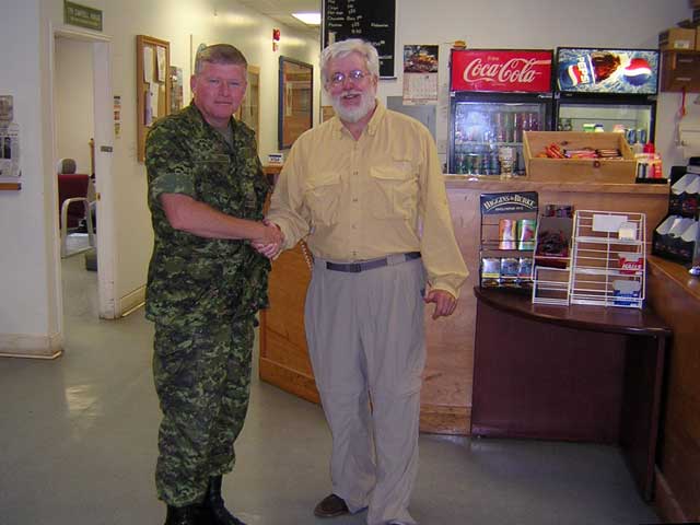 Photo: JWH and Regimental Sargent Major at Kit Shop