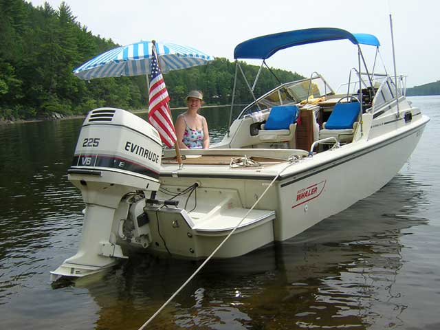 Photo: CONTINUOUSWAVE stern and cockpit showing improvised sun umbrella for shade.