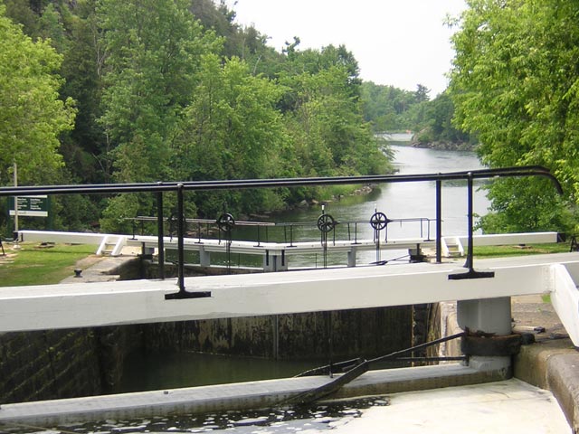 Photo: View downstream from second chamber of lock stair step at Kingston Mills