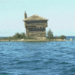 Photo:  Old structure guards a lonely point