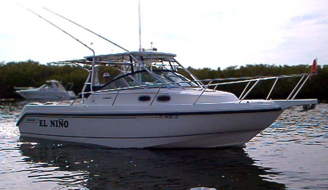 Photo: 28-Conquest with twin outboards