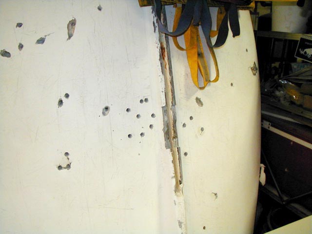 Photo: Boston Whaler Squall hull with holes for draining entrapped moisture