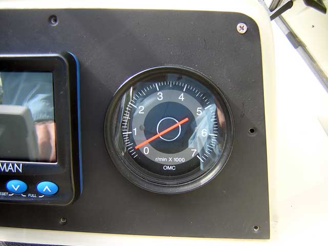 Photo: Close-up of new panel showing good alignment to existing holes in dashboard.