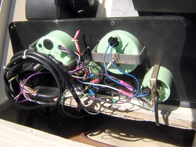 Photo: Rear of instrument panel showing existing wiring details.