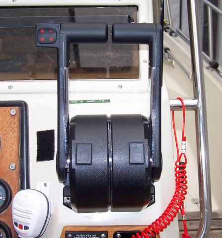 [Photo: Close up view of the dual remote controls.]
