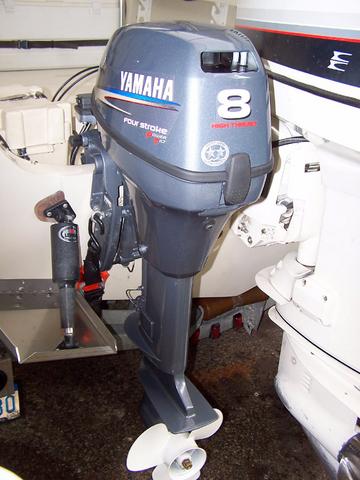 [Photo: View of transom from stern showing both engines amidship.]