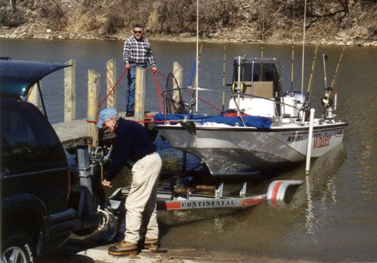Photo: Launch ramp with courtesy dock, loading on keel roller trailer