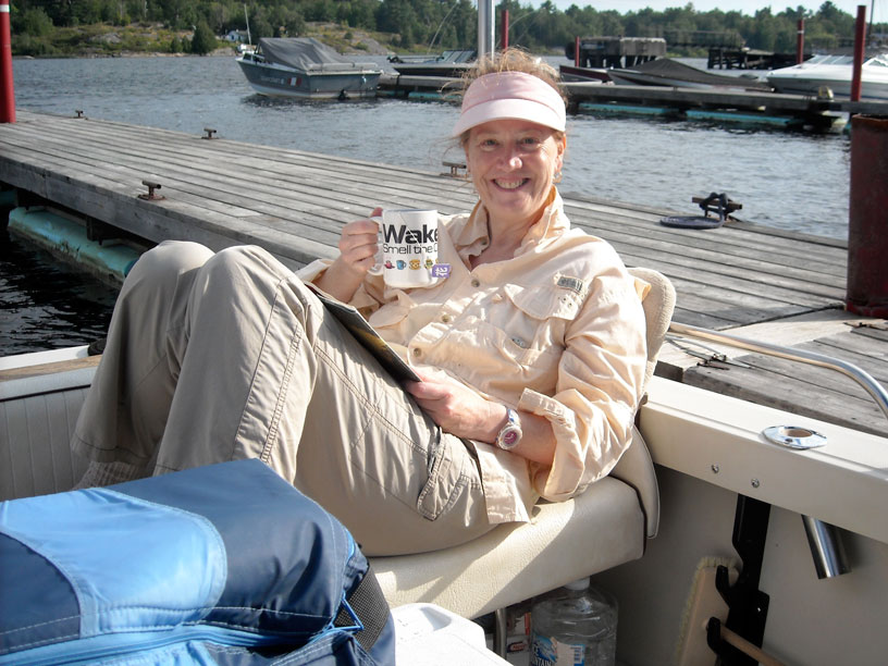 Photo: Chris relaxing in cockpit at Byng Inlet.