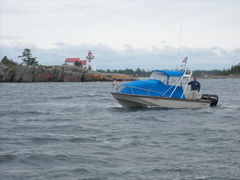 Photo: Dave Buckalew aboard GAMBLER, near Pointe Au Baril, Ontario.