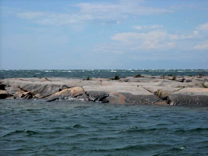 Photo: In confused seas and breakers at Hangdog Reef.