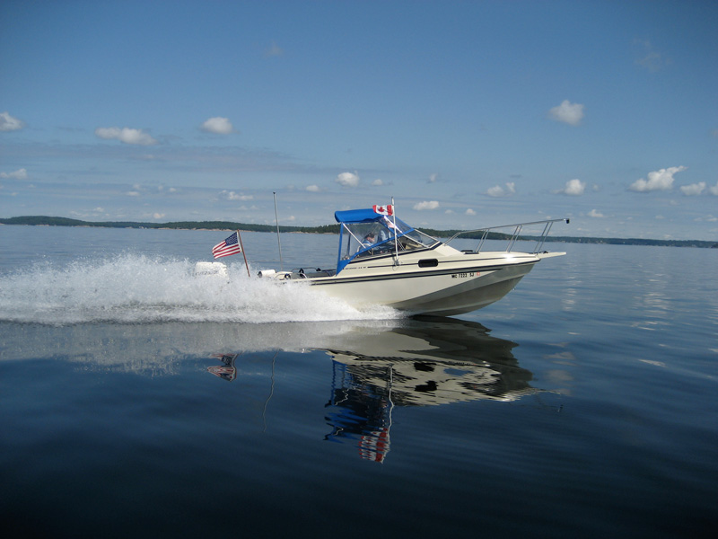 Photo: At top speed on a clam Parry Sound, Ontario.