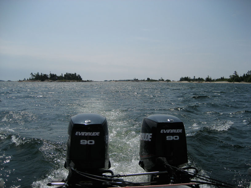 Photo: Twin E-TEC 90-HP outboards