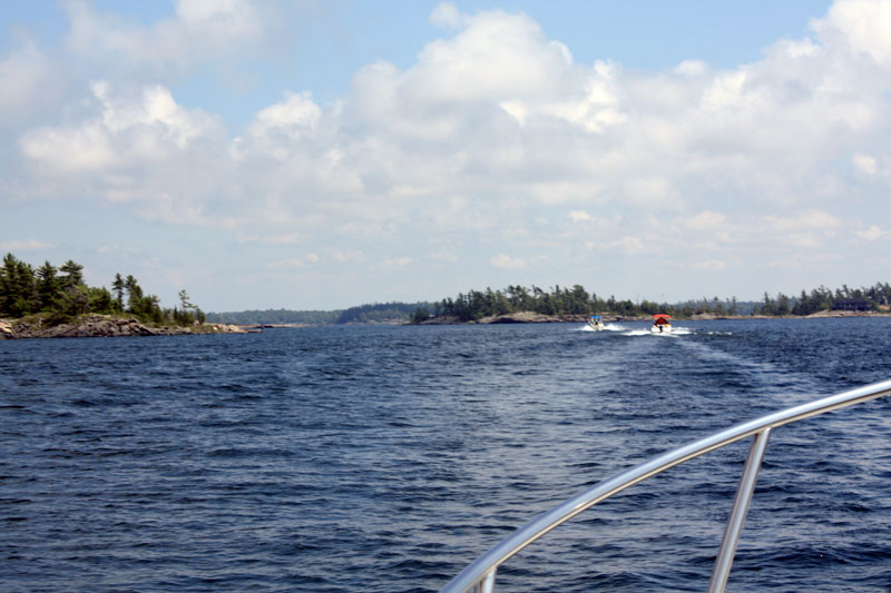 Photo: Boston Whale boats transiting rugged coastline inshore route.