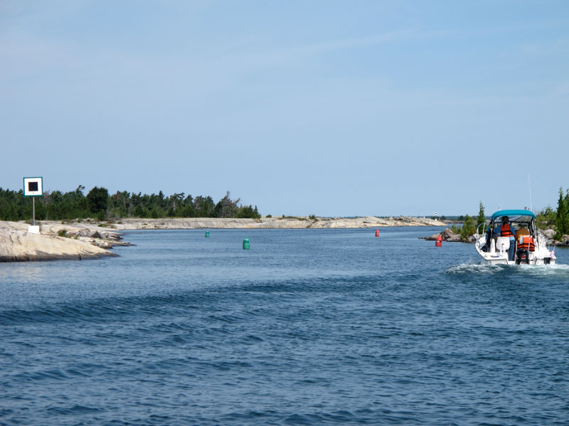 Photo: Boat transits ROGERS GUT.