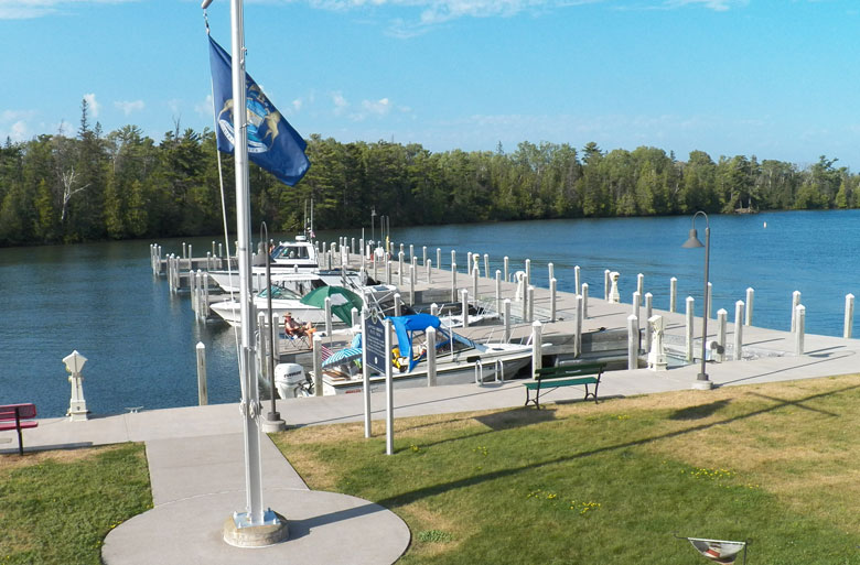 Photo: View of docks at Copper Harbor with the four boats of our fleet.