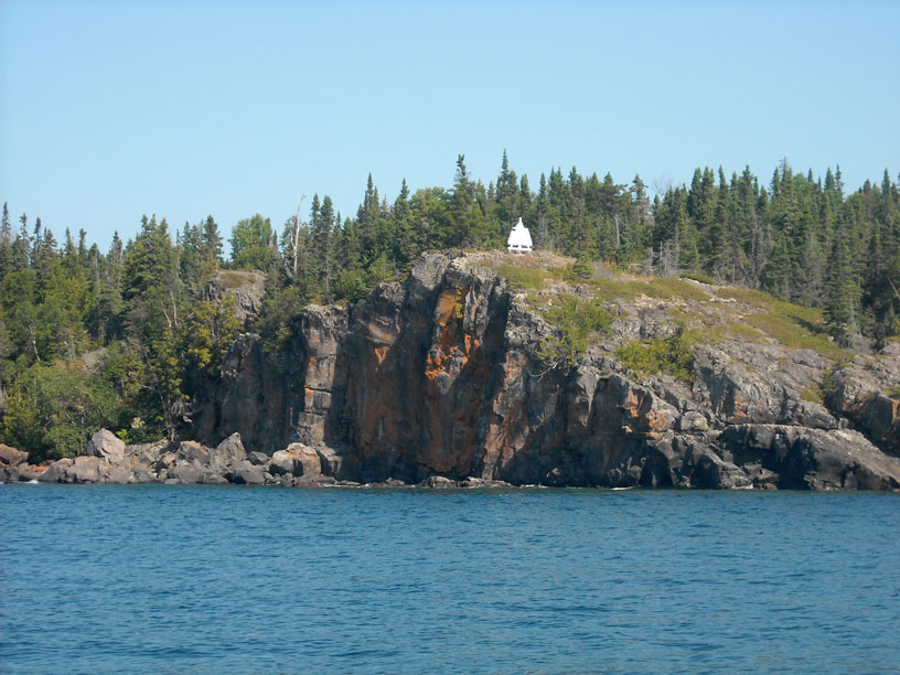 Photo: Charted object: Chippewa Harbor Daybeacon. Shape: rombus. Color: orange, white, border stripe