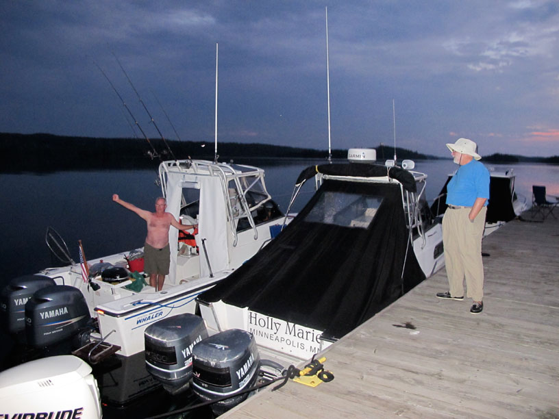 Photo: Boats and boaters at the dock on Belle Isle, Lake Superior.