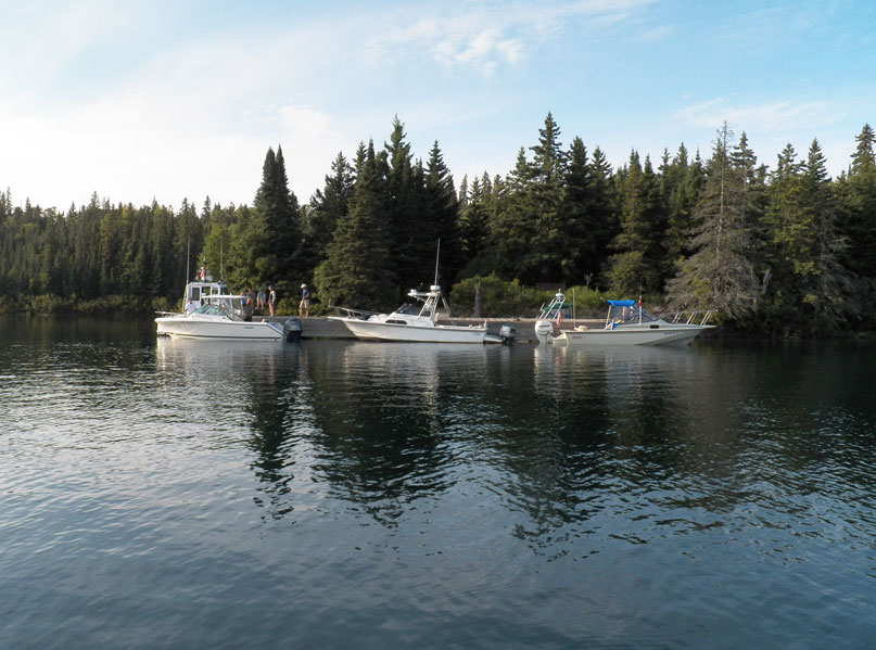 Photo: Four boats at the dock at Belle Isle, Lake Superior.