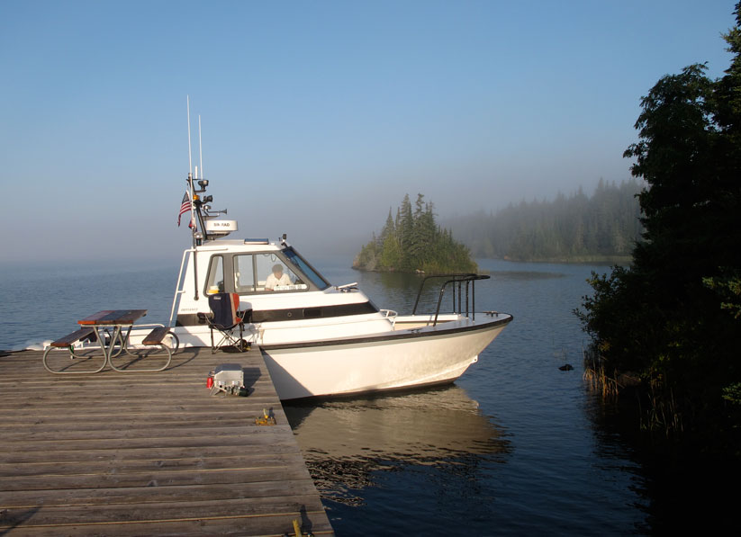 Photo: Sunlit dock at Belle Isle, Isle Royale National Park.