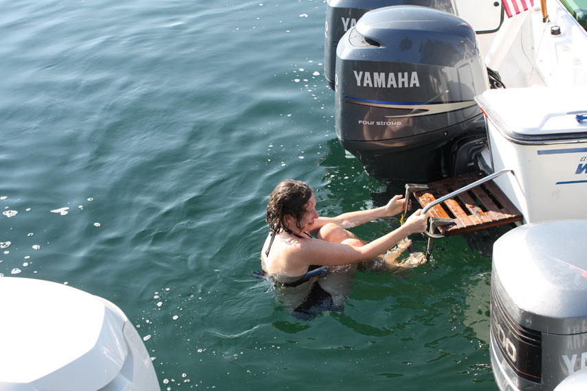 Photo: Climbing out of into Lake Superor at Belle Isle, Isle Royale National Park.