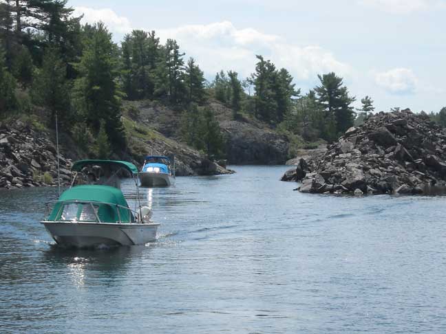 Photo: Boats trasiting the very narrow Government Cut in McGregor Bay.