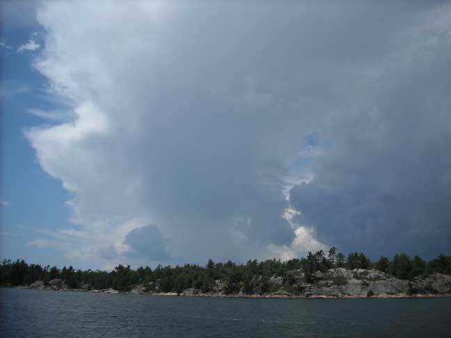 Photo: Towering thunderstrom clouds.