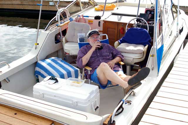 Photo: Jim Hebert relaxing in cockpit of CONTINUOUSWAVE.